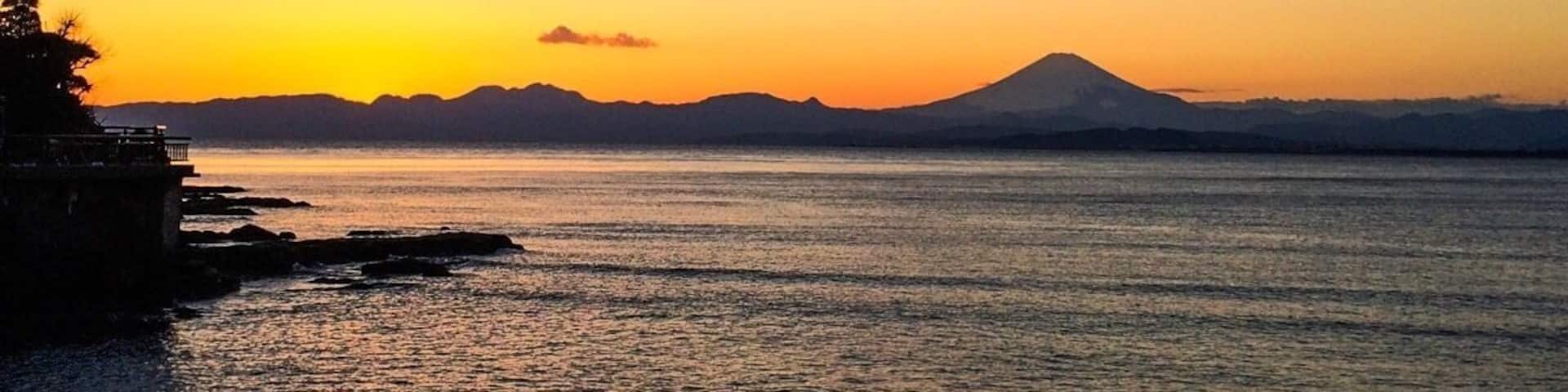 Mt. Fuji at sunset. The view from the walking bridge off the Shonan Coast to Enoshima Island. It's about an hour train ride outside Tokyo. Absolutely gorgeous.
#BeachBound #MtFuji #Japan #sunset #Enoshima #Fuji