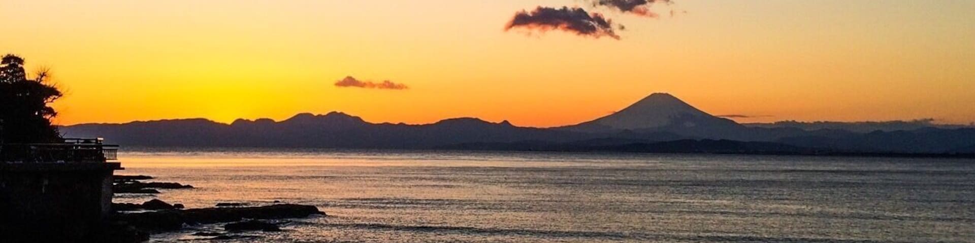 Mt. Fuji at sunset. The view from the walking bridge off the Shonan Coast to Enoshima Island. It's about an hour train ride outside Tokyo. Absolutely gorgeous. 
#BeachBound #MtFuji #Japan #sunset #Enoshima #Fuji