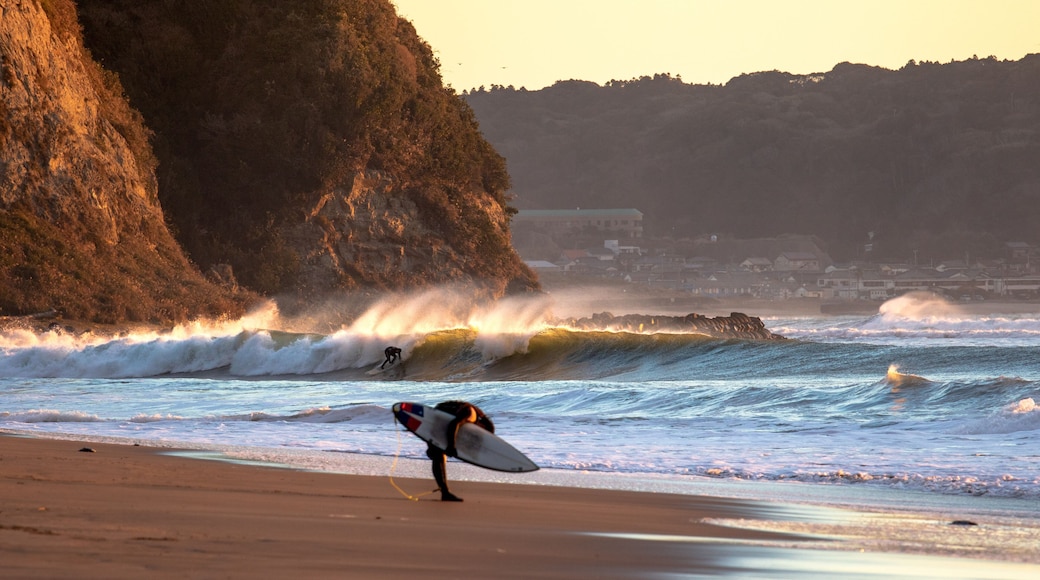 surfing a wave in Japan , lareg waves created by Tyhoon swell in Asia.