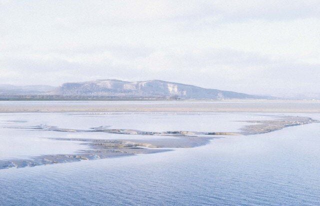 Whitbarrow Scar from Sandside Pure luck that I chose a minimum exposure which captured the delicate, watery light.