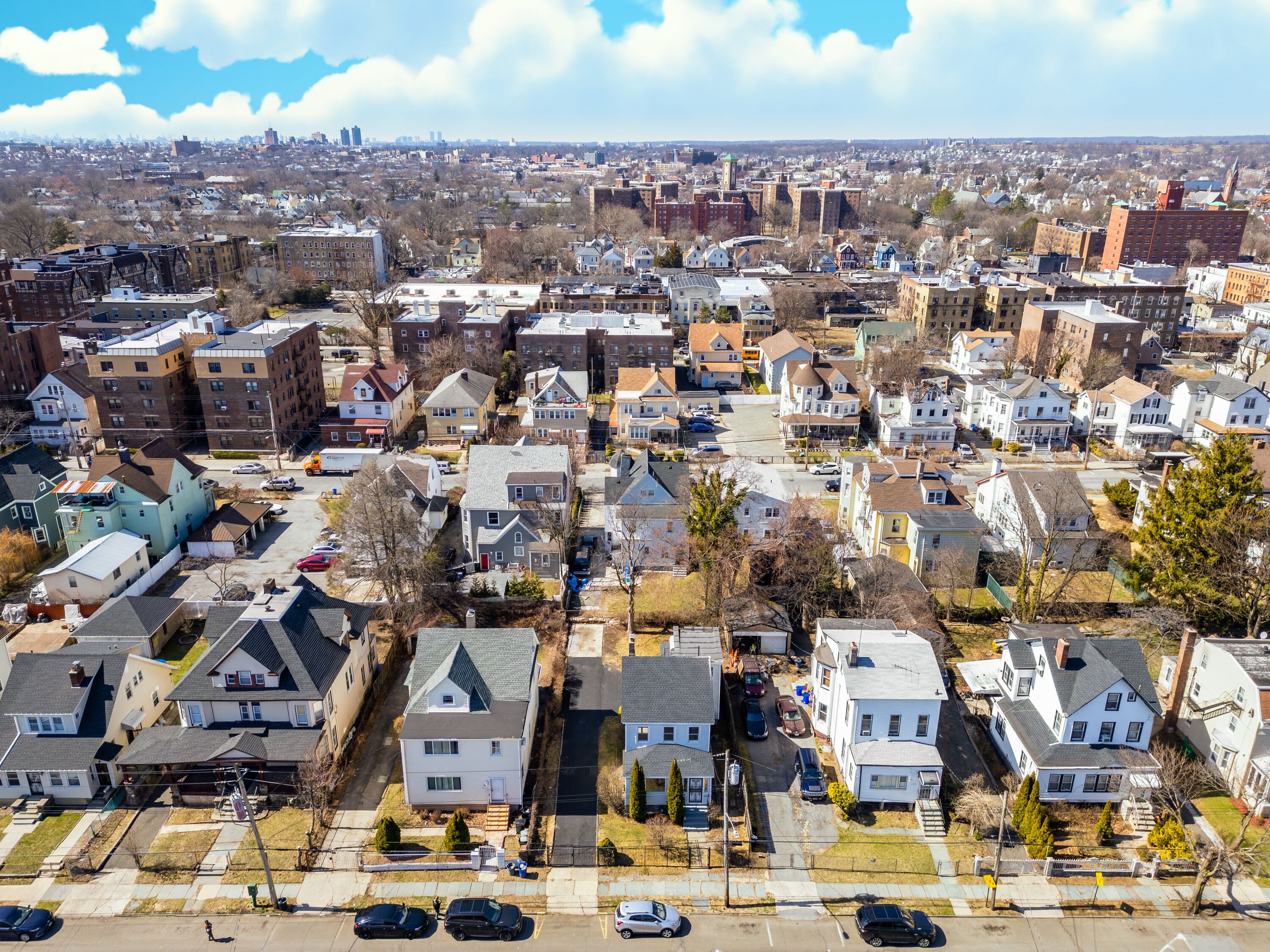 Aerial view over Brooklyn featuring Belt Parkway, Shirley Chisholm State Park, Spring Creek Beach, Pennsylvania Ave, Flatlands Ave, and Howard Beach.