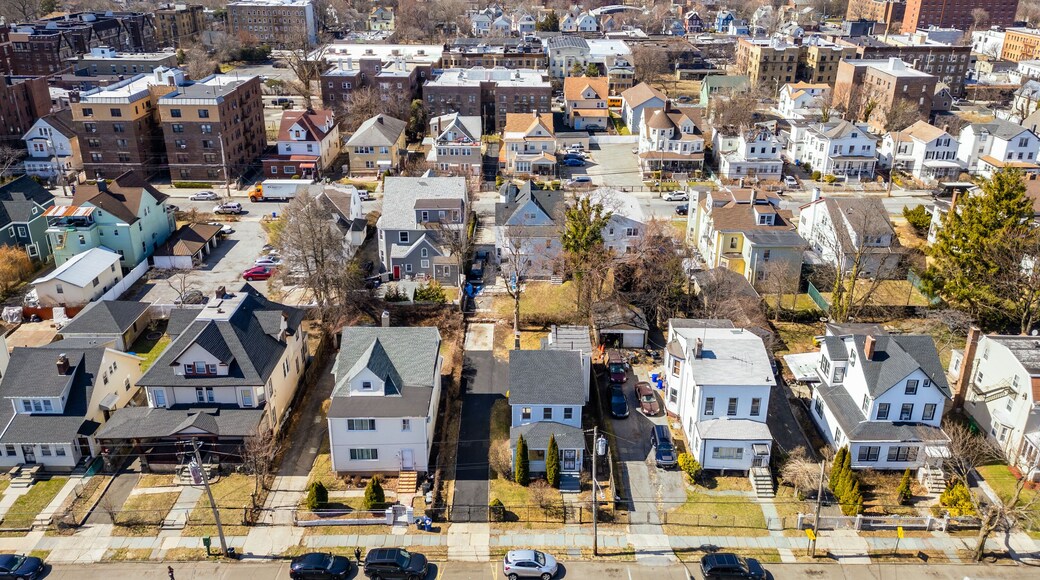 Aerial view over Brooklyn featuring Belt Parkway, Shirley Chisholm State Park, Spring Creek Beach, Pennsylvania Ave, Flatlands Ave, and Howard Beach.