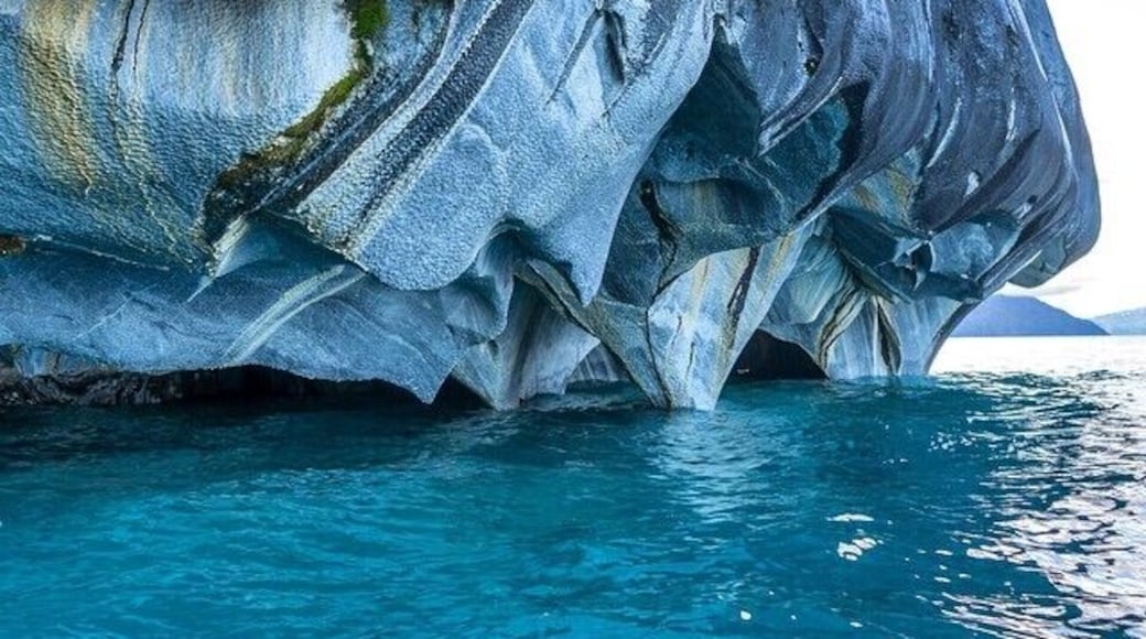 The Marble Cathedral in the General Carrera lake has incredibly beautiful shapes and is surrounded by crystal clear turquoise water! #Cave #Cathedral #Nature #Patagonia