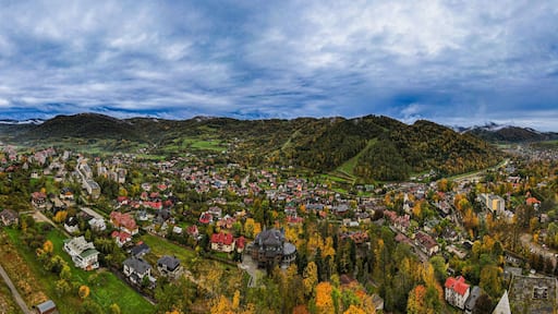 Szczawnica is a spa town in Poland,on the border of the Pieniny and Beskid Sądecki mountain ranges. Dunajec River, the charming Grajcarek stream, aerial drone view, autumn landscape