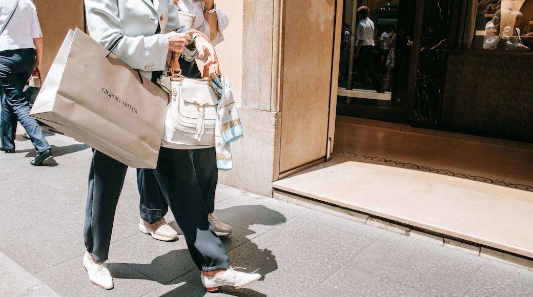 Via Condotti showing street scenes as well as a couple