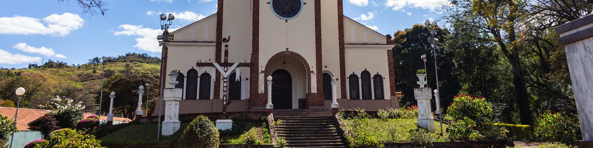Igreja Nossa Senhora de Lourdes em Águas da Prata - ÁGUAS DA PRATA, SP, BRAZIL - JULY 23, 2023: Our Lady of Lourdes Church in the middle of its beautiful garden.