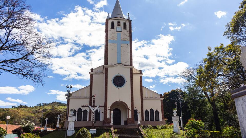 Igreja Nossa Senhora de Lourdes em Águas da Prata - ÁGUAS DA PRATA, SP, BRAZIL - JULY 23, 2023: Our Lady of Lourdes Church in the middle of its beautiful garden.