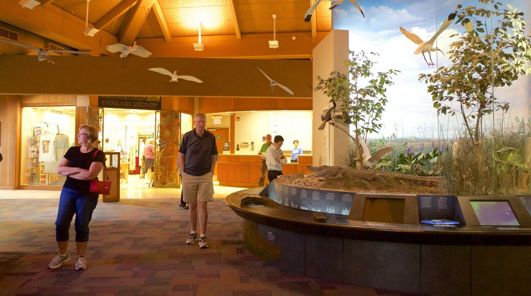 Ernest F. Coe Visitor Center featuring interior views as well as a small group of people