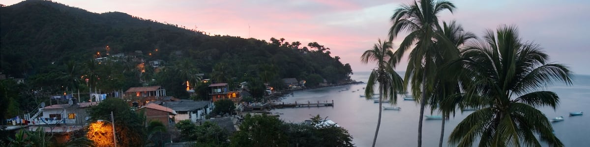 The beach town and fishing village of Yelapa at sunset, near Puerto Vallarta, Jalisco State, Mexico