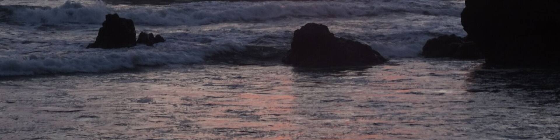 Sunset over the Pacific Ocean from Ostional Beach.
The black sand beach is strewn with white egg shells. Remnants of a recent sea turtle hatchling parade.