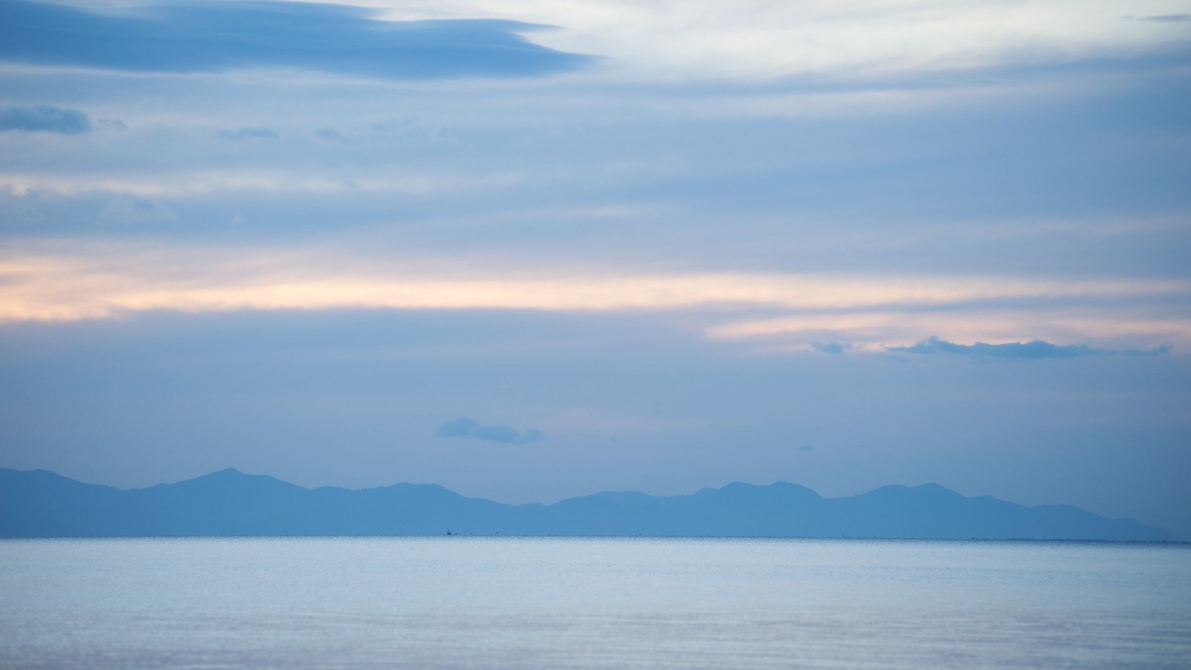 Trat which includes general coastal views, landscape views and mist or fog