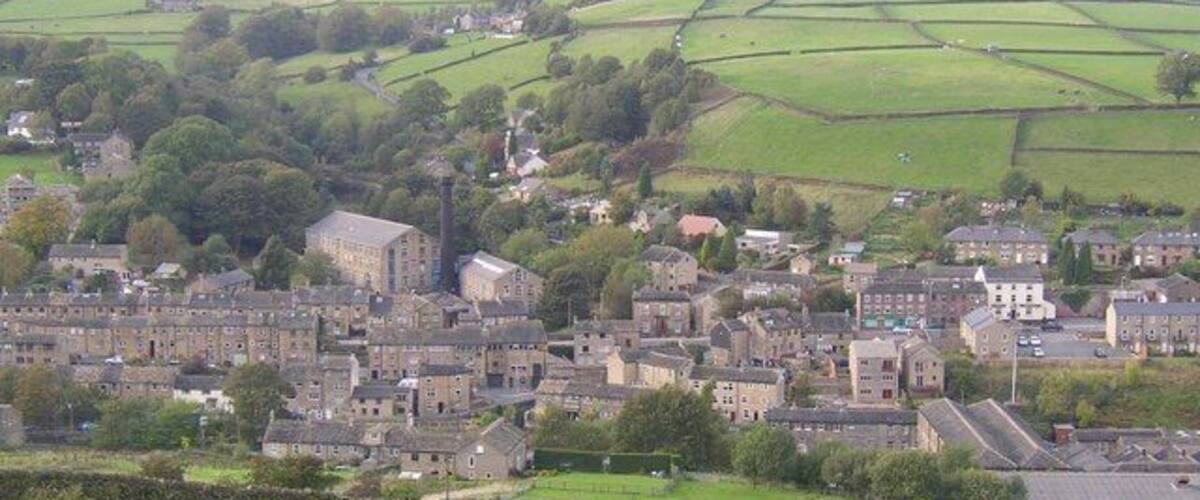 View of Hinchcliffe Mill from Acre Lane, Cartworth The subject GR is the field with the cow; beyond that is the hamlet of Hinchcliffe Mill, which looks to be worth exploring. The hillside opposite is in Austonley township, and has a maze of little lanes.
