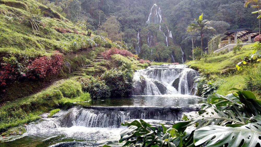 Colombia , Salento 2022 - Termales Santa Rosa de Cabal is a Spa thermal baths immersed in nature outdoors with waterfall and hot water tubs for the well-being of the body - tourist attraction