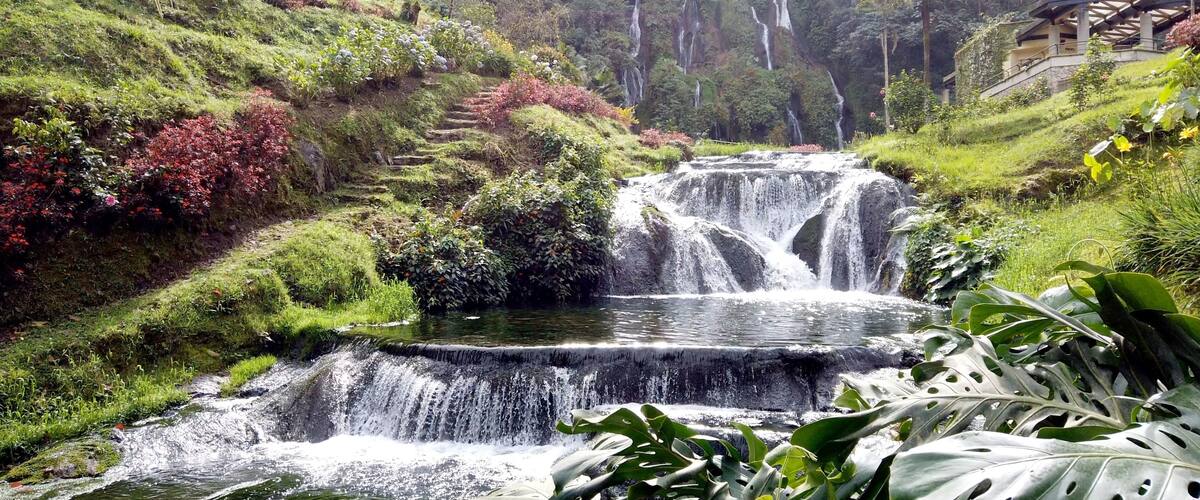 Colombia , Salento 2022 - Termales Santa Rosa de Cabal is a Spa thermal baths immersed in nature outdoors with waterfall and hot water tubs for the well-being of the body - tourist attraction