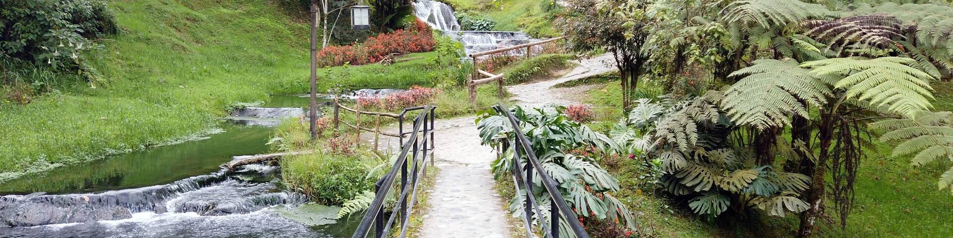 Colombia , Salento 2022 - Termales Santa Rosa de Cabal is a Spa thermal baths immersed in nature outdoors with waterfall and hot water tubs for the well-being of the body - tourist attraction