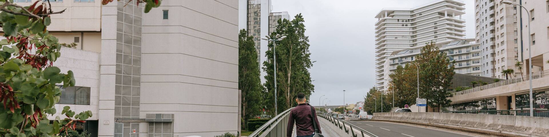 Sete Rios which includes a city and street scenes as well as an individual male