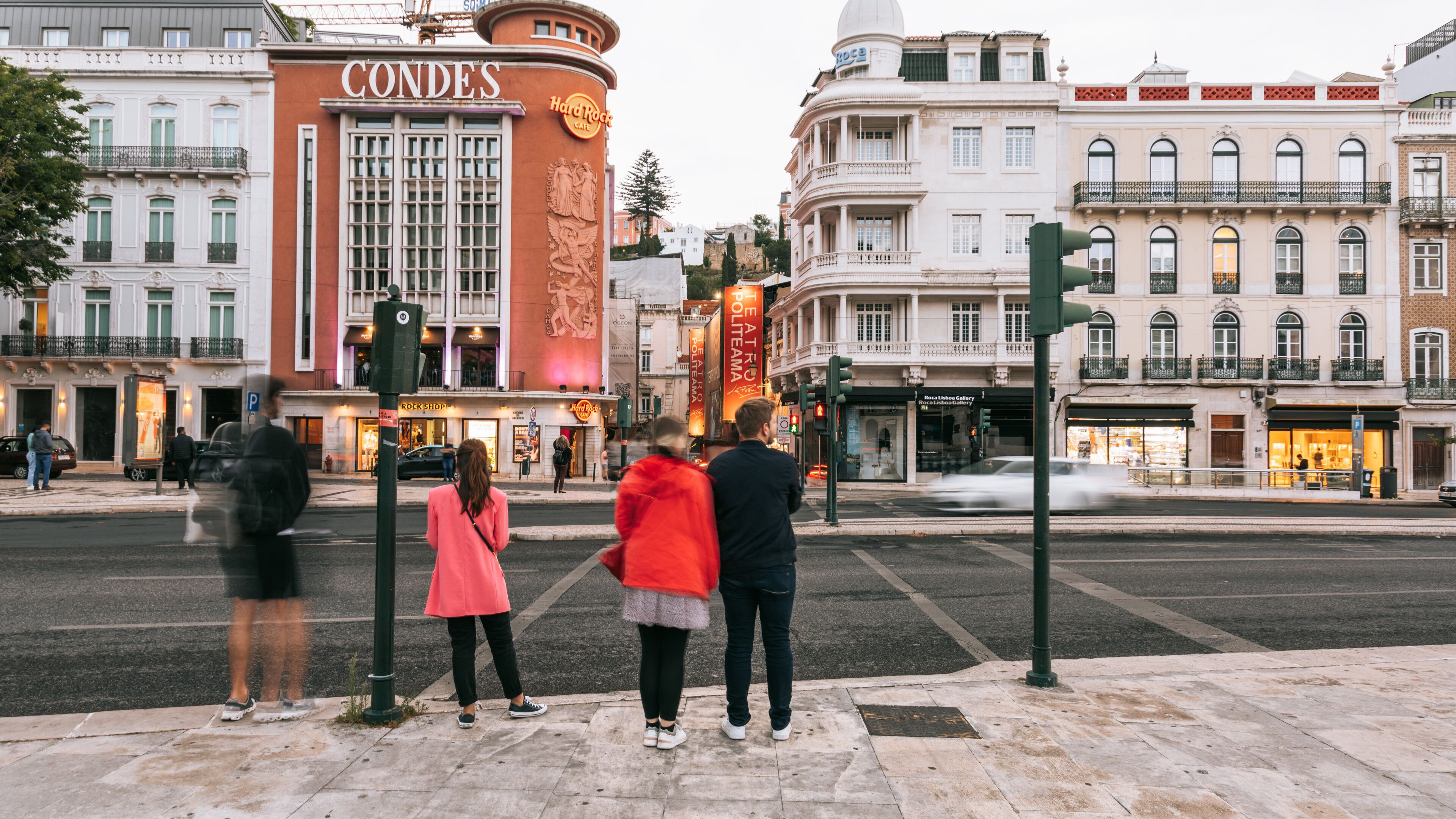 Avenida da Liberdade showing street scenes and a city as well as a small group of people
