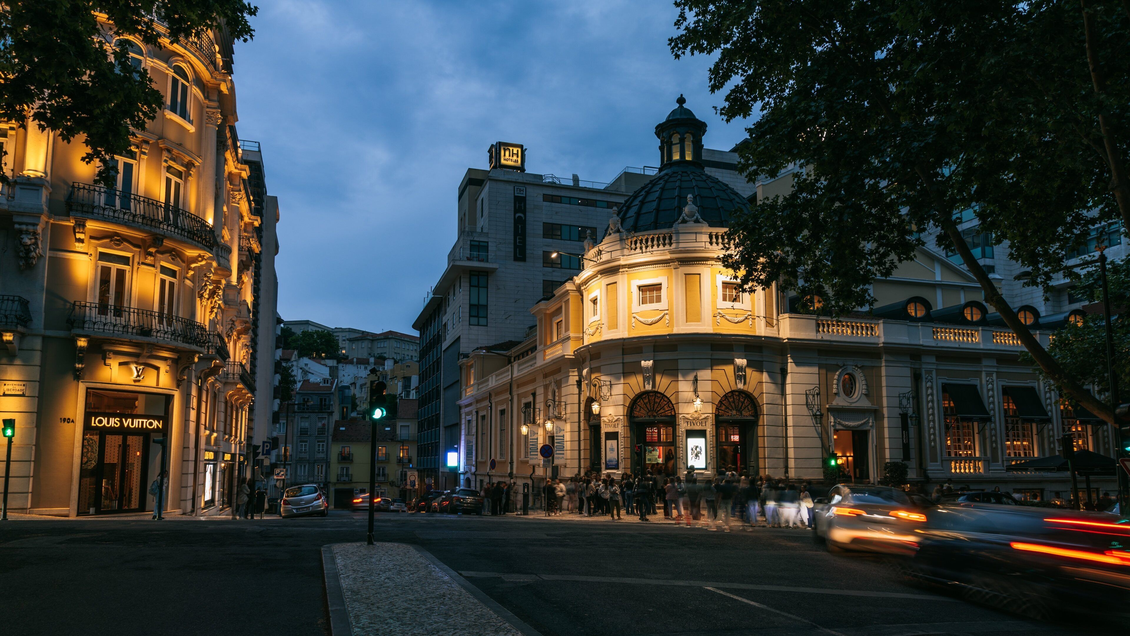 Avenida da Liberdade which includes night scenes and a city