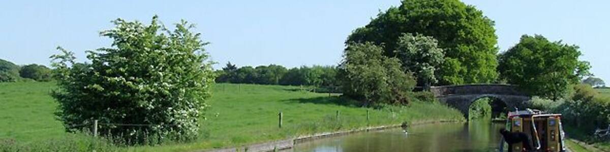 Shropshire Union Canal near Market Drayton, Shropshire. Approaching Tyrley Castle Bridge.