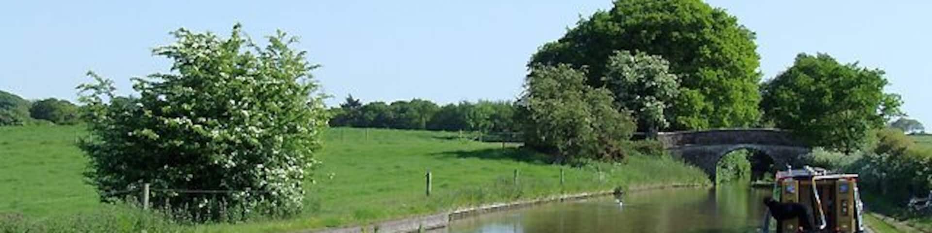 Shropshire Union Canal near Market Drayton, Shropshire. Approaching Tyrley Castle Bridge.