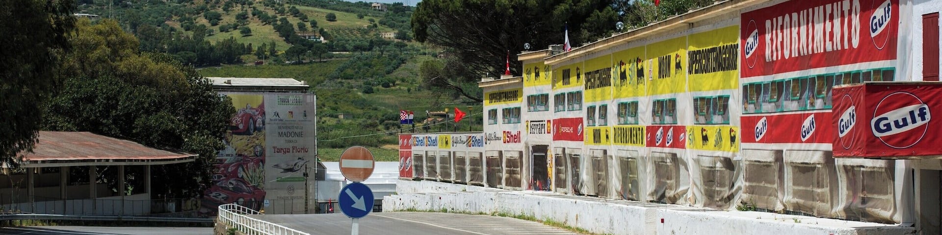 Created in 1906 by the wealthy pioneer race driver and automobile enthusiast, Vincenzo Florio, the Targa Florio was an open road endurance automobile race held in the mountains of Sicily near Palermo. This is the pits area and the start finish line.