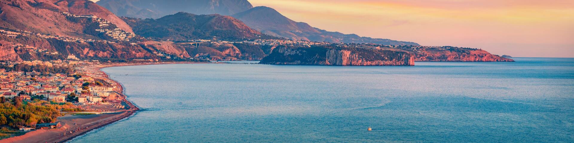Astonishing summer scene of Mediterranean coast of Italy. Picturesque sunset on Tortora Marina town, Province of Cosenza, Italy, Europe. Traveling concept background.