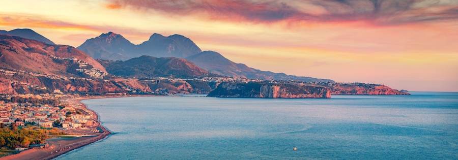 Astonishing summer scene of Mediterranean coast of Italy. Picturesque sunset on Tortora Marina town, Province of Cosenza, Italy, Europe. Traveling concept background.