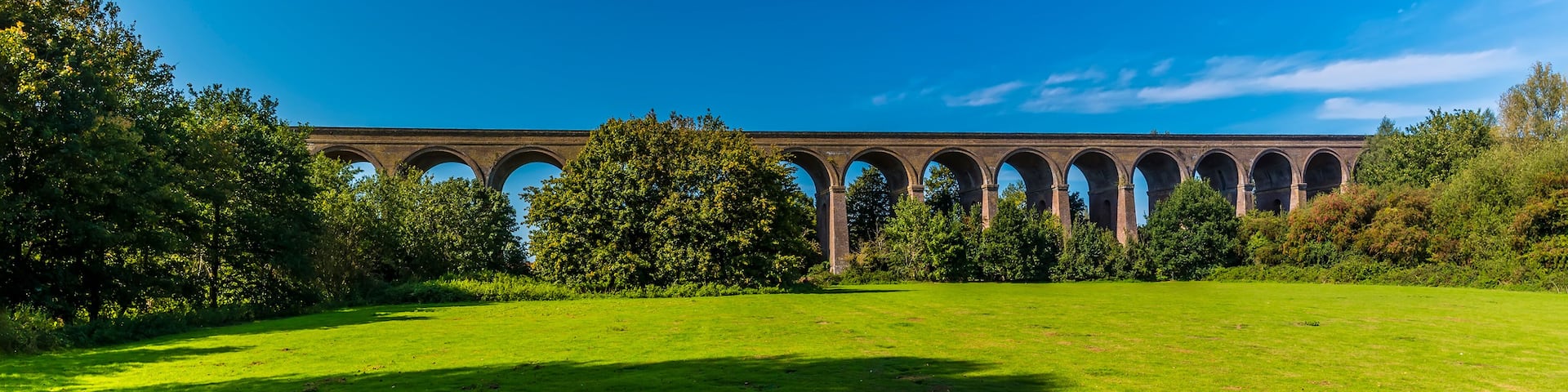A panorama view across the middle section of the Chappel Viaduct near Colchester, UK in summertime