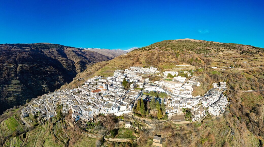 Aerial view above the beautiful village of Capileira in the gorge of the Poqueira in Andalusia Spain