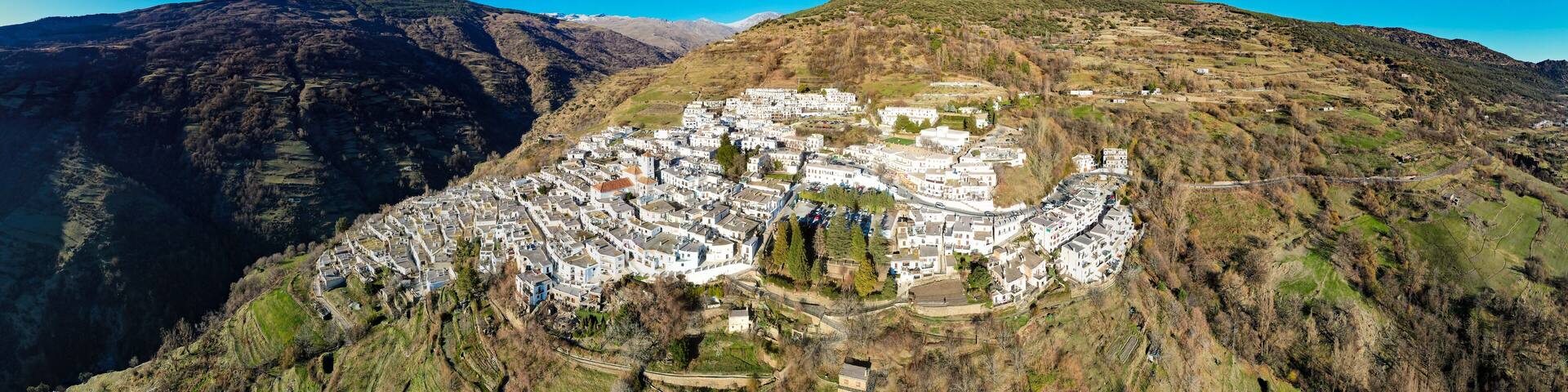 Aerial view above the beautiful village of Capileira in the gorge of the Poqueira in Andalusia Spain
