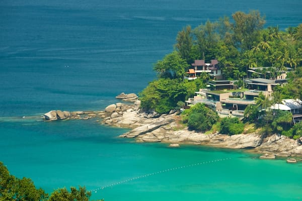 Phuket - Phang Nga which includes a bay or harbour, a coastal town and rugged coastline