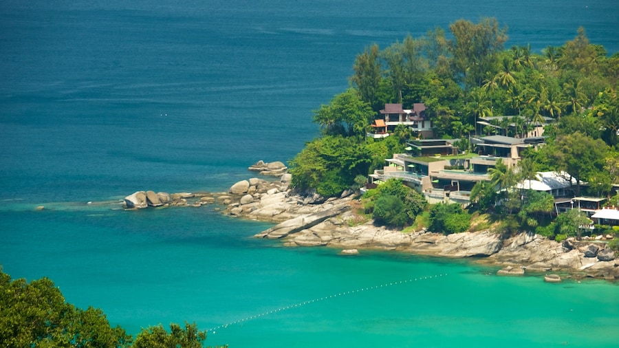 Phuket - Phang Nga showing a coastal town, a bay or harbor and rocky coastline