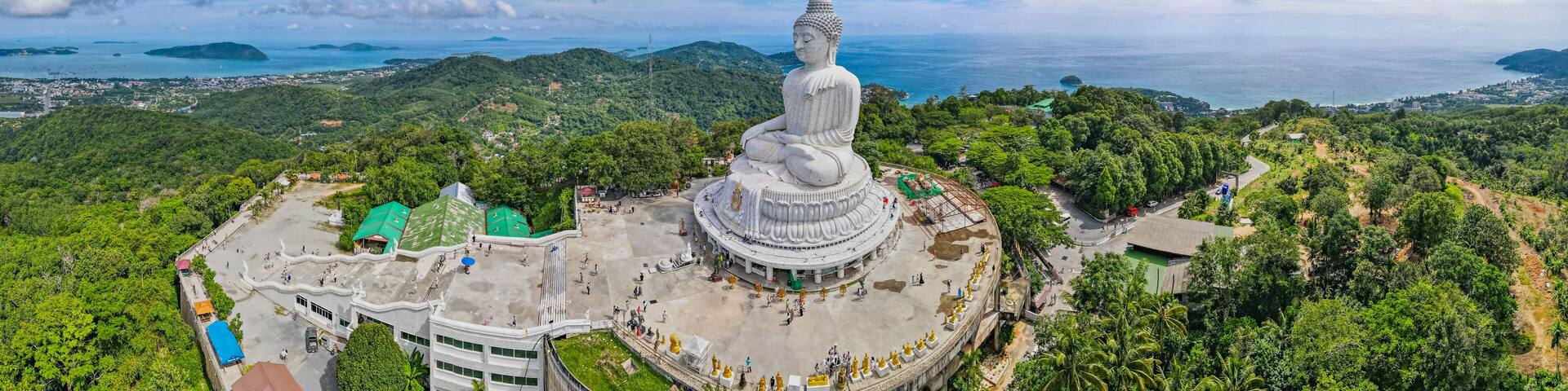 Wide angle view of the Big White Buddha, Phuket, a landmark of Thailand. Copy the area above the sky.
