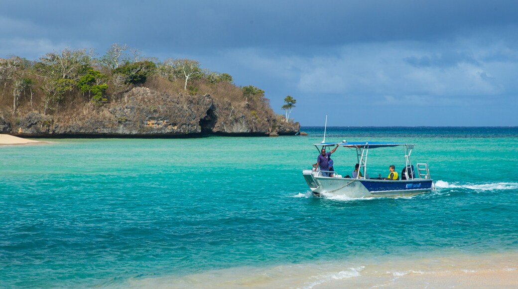 Natadola Beach which includes boating, tropical scenes and general coastal views