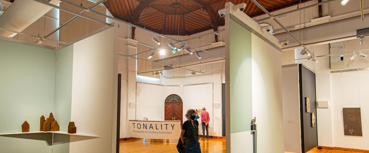 Wangaratta Art Gallery showing interior views as well as an individual femail