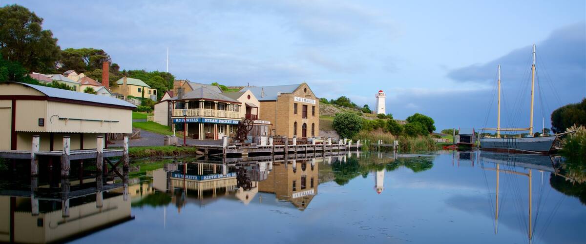 Flagstaff Hill Maritime Village which includes a bay or harbor and a coastal town