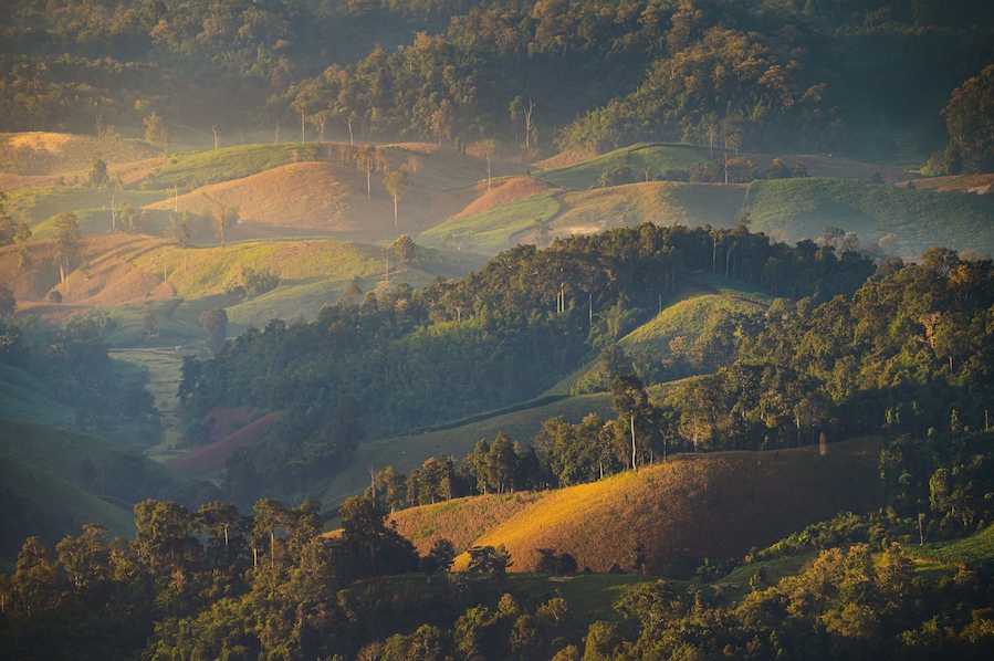 Beautiful sunrise mountain range in Tha Song Yang district located in Tak province, Thailand