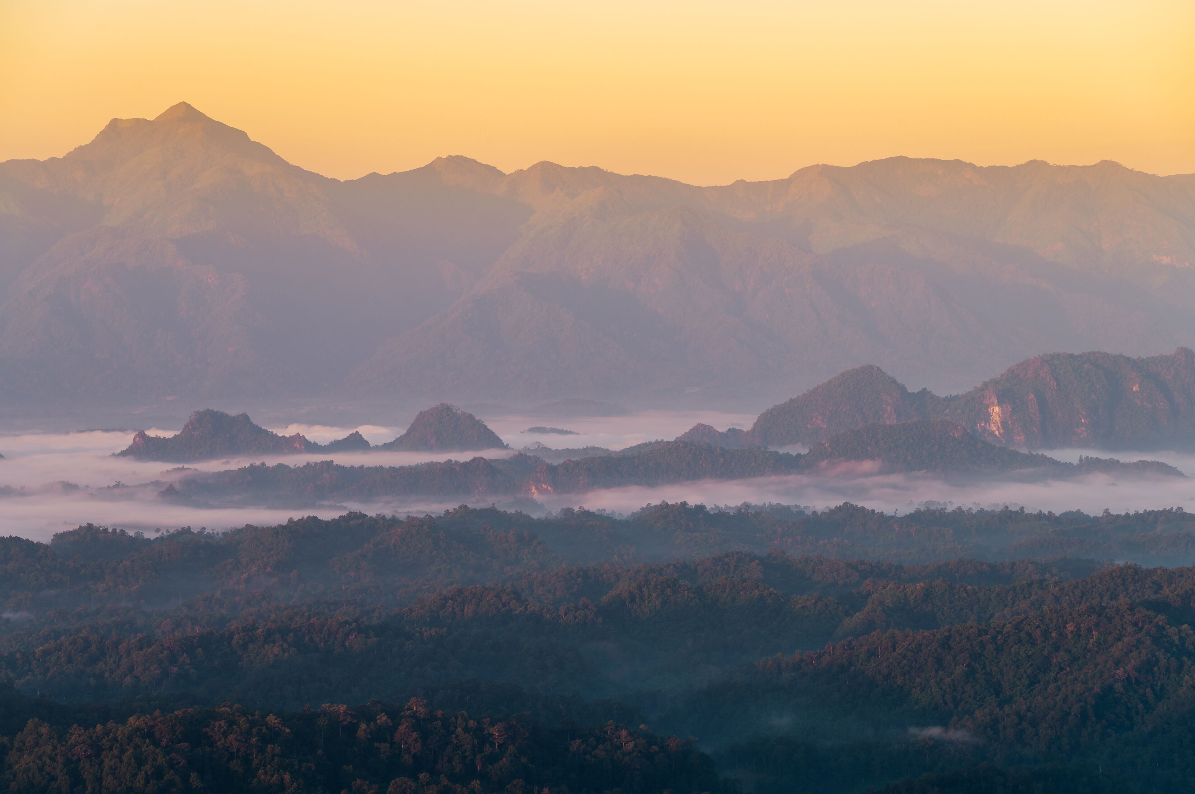 Beautiful sunrise mountain range in Tha Song Yang district located in Tak province, Thailand