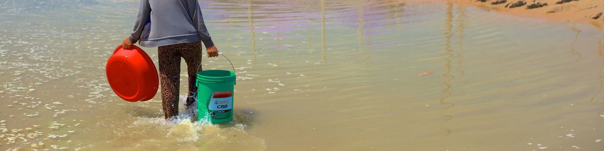 Long Hai Beach featuring general coastal views and a sandy beach as well as an individual femail