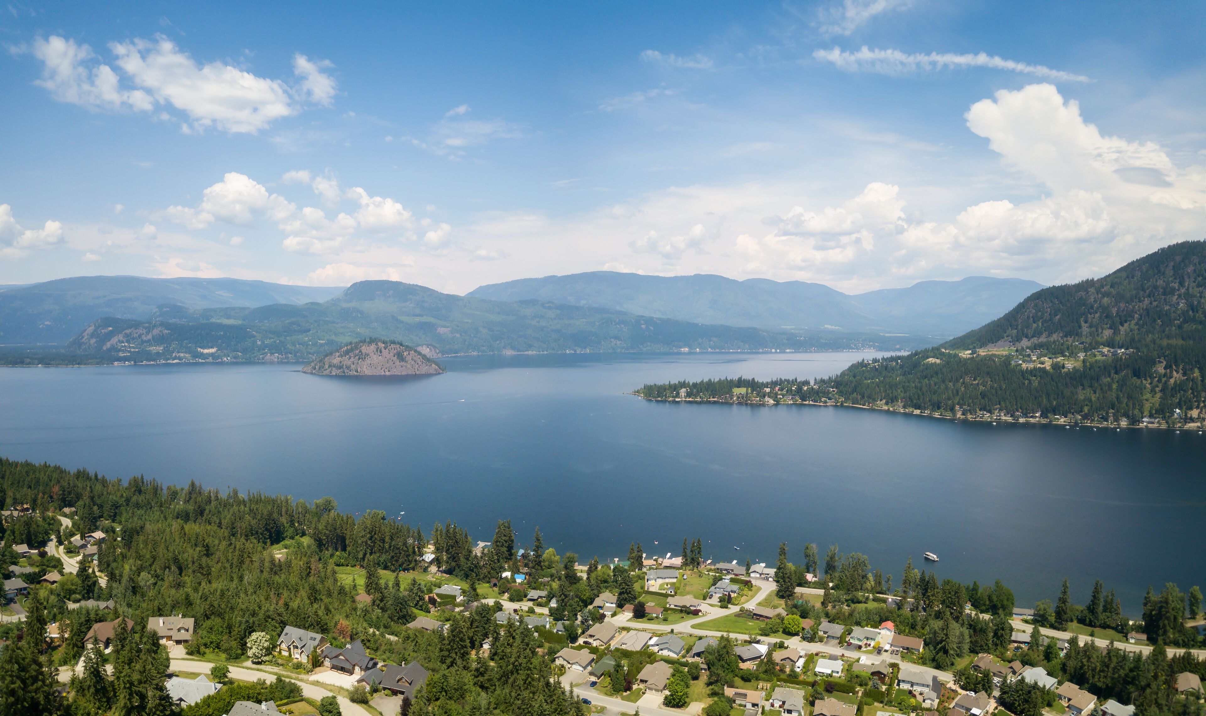 Aerial panoramic view of a little town, Blind Bay, during a vibrant sunny summer day. Taken in the Interior BC, Canada.