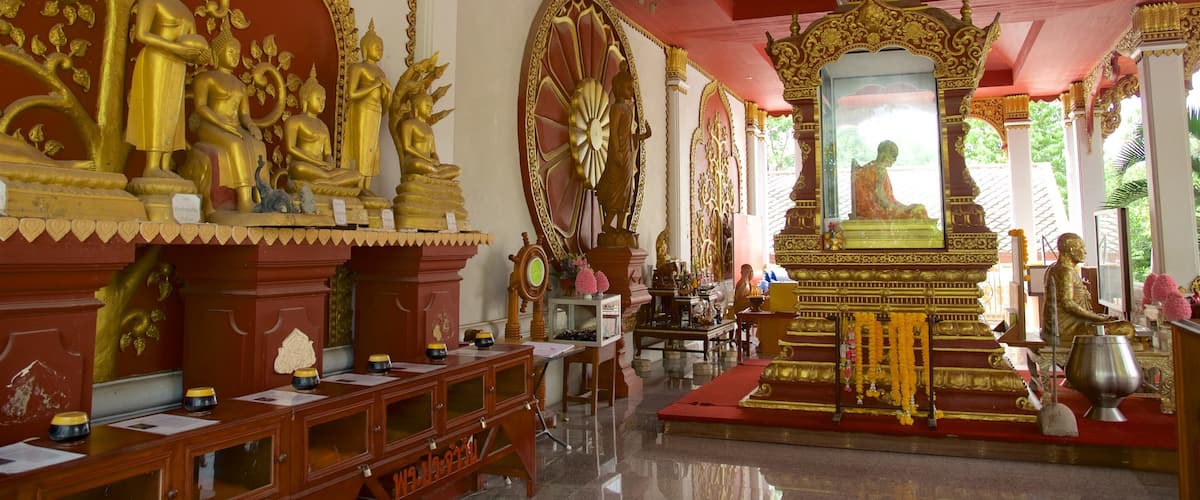 Khunaram Temple which includes a temple or place of worship and interior views