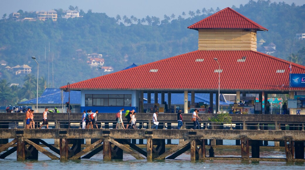 Nathon Pier which includes a bay or harbor as well as a small group of people