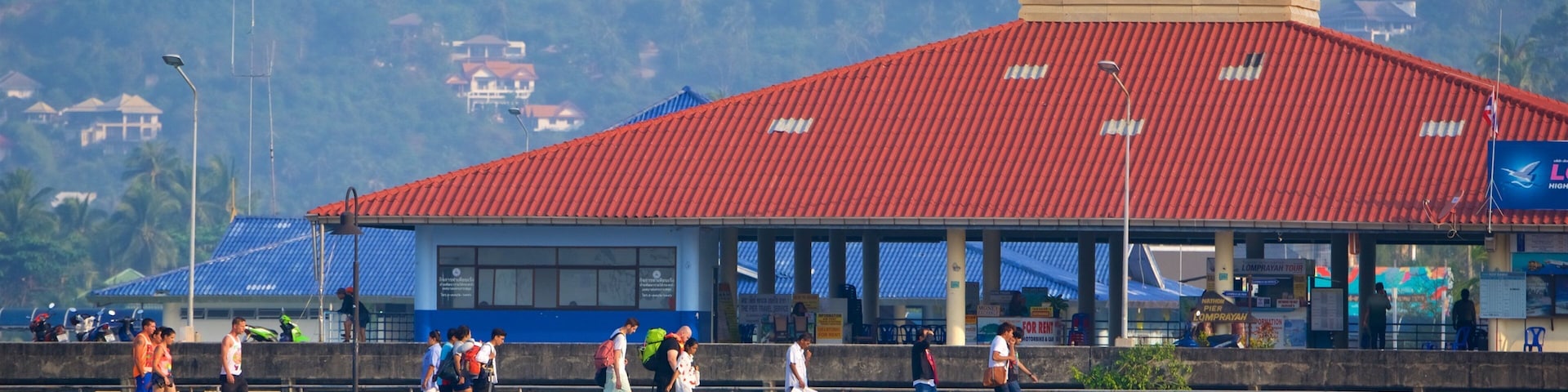 Nathon Pier which includes a bay or harbor as well as a small group of people