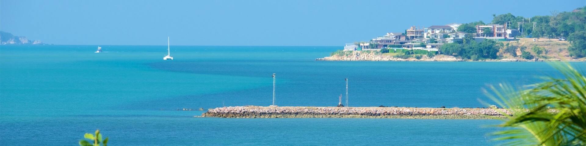 Big Buddha Beach Pier showing rugged coastline and a bay or harbor