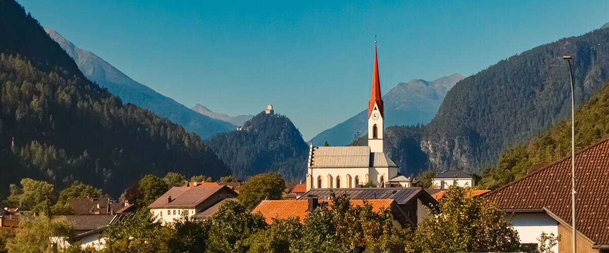 Alpine summer view with a church near Mils, Imst, Tyrol, Austria