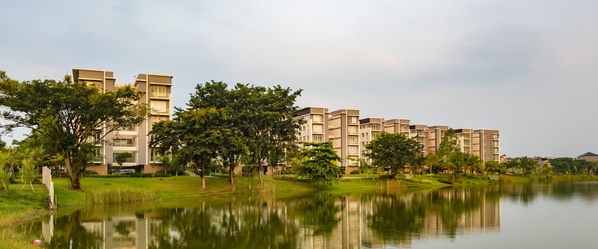 Tangerang, Indonesia - 7th June 2019: Rainbow Springs Condo Villa, a luxury apartment complex, next to a lake, in Gading Serpong residential area. It is an area with high property development.