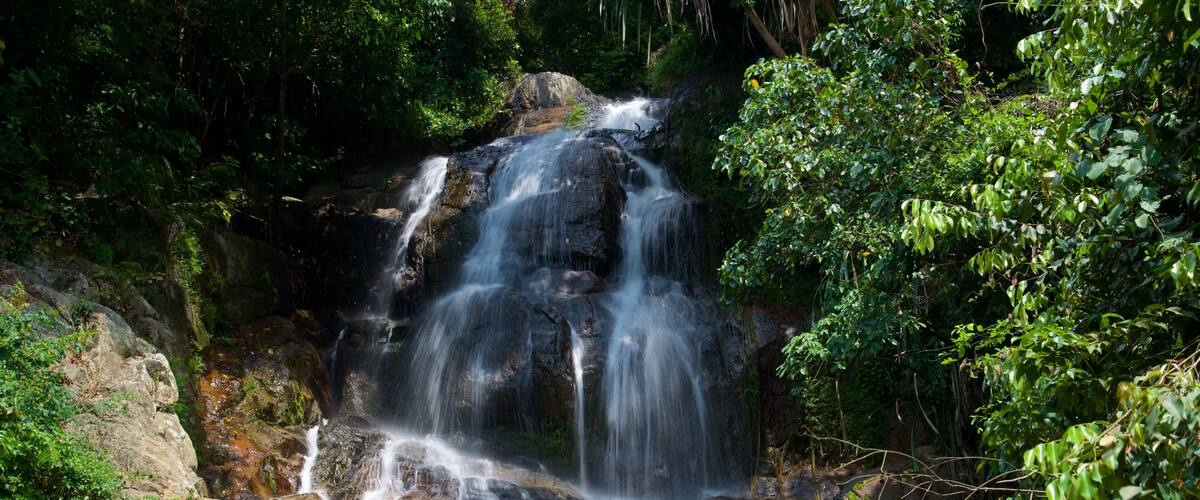 Namuang Waterfall showing forest scenes and a cascade