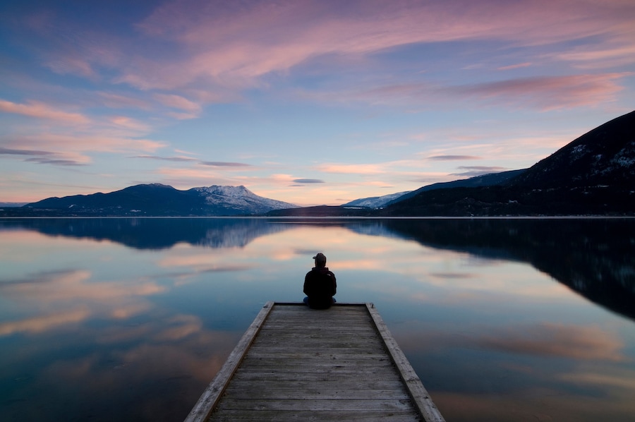 Taking in the sunset colours over Shuswap Lake in Sunnybrae, near Salmon Arm, British Columbia, Canada. MR102