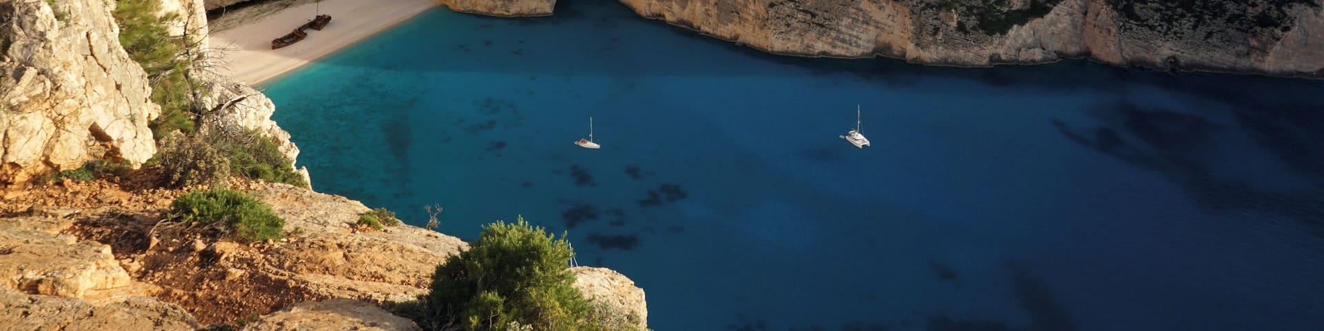 The breathtaking Navagio (ÎαÏ
ÎŹÎłÎčÎż) bay at sunset #LifeAtExpedia #SeasideDiscoveries