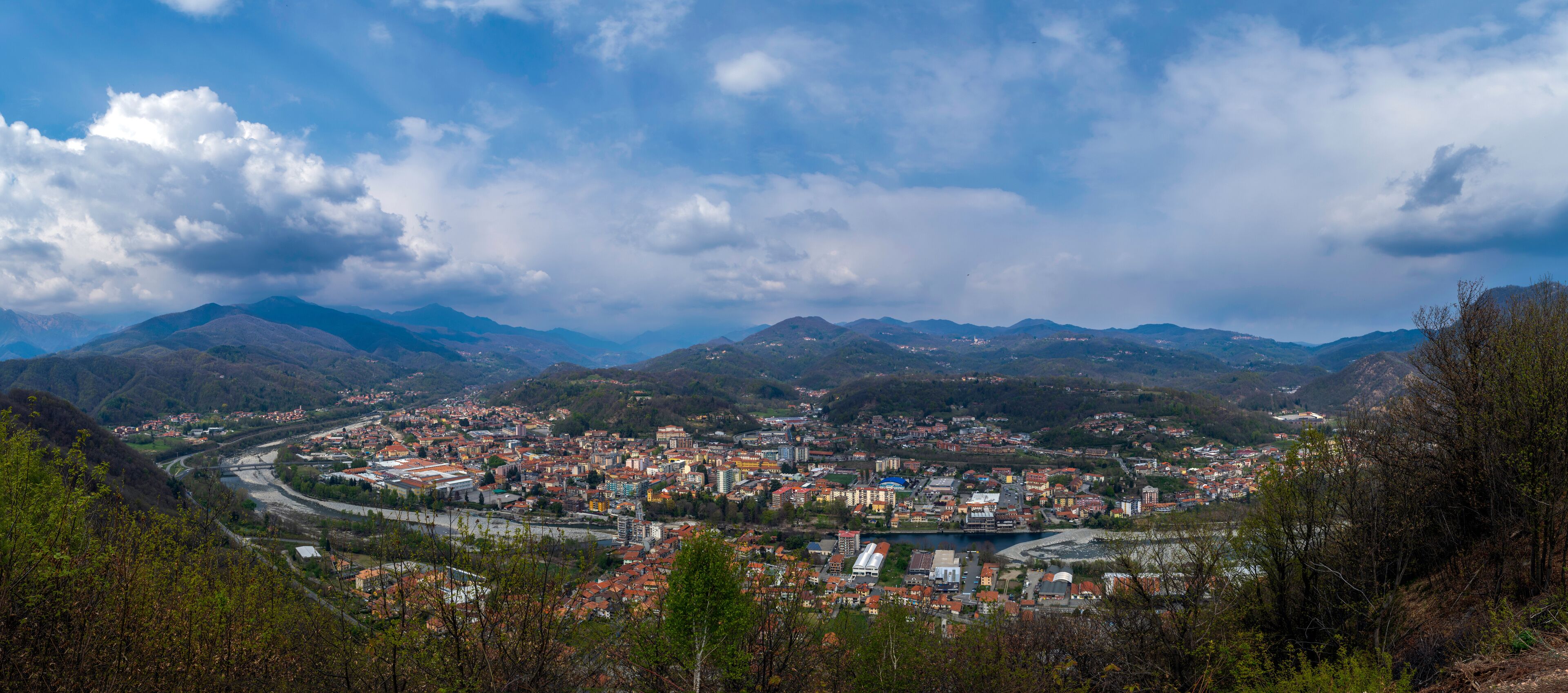 A mountainous landscape with a town nestled in the valley.